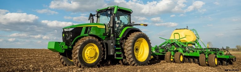 John Deere 7R tractor in a farm field